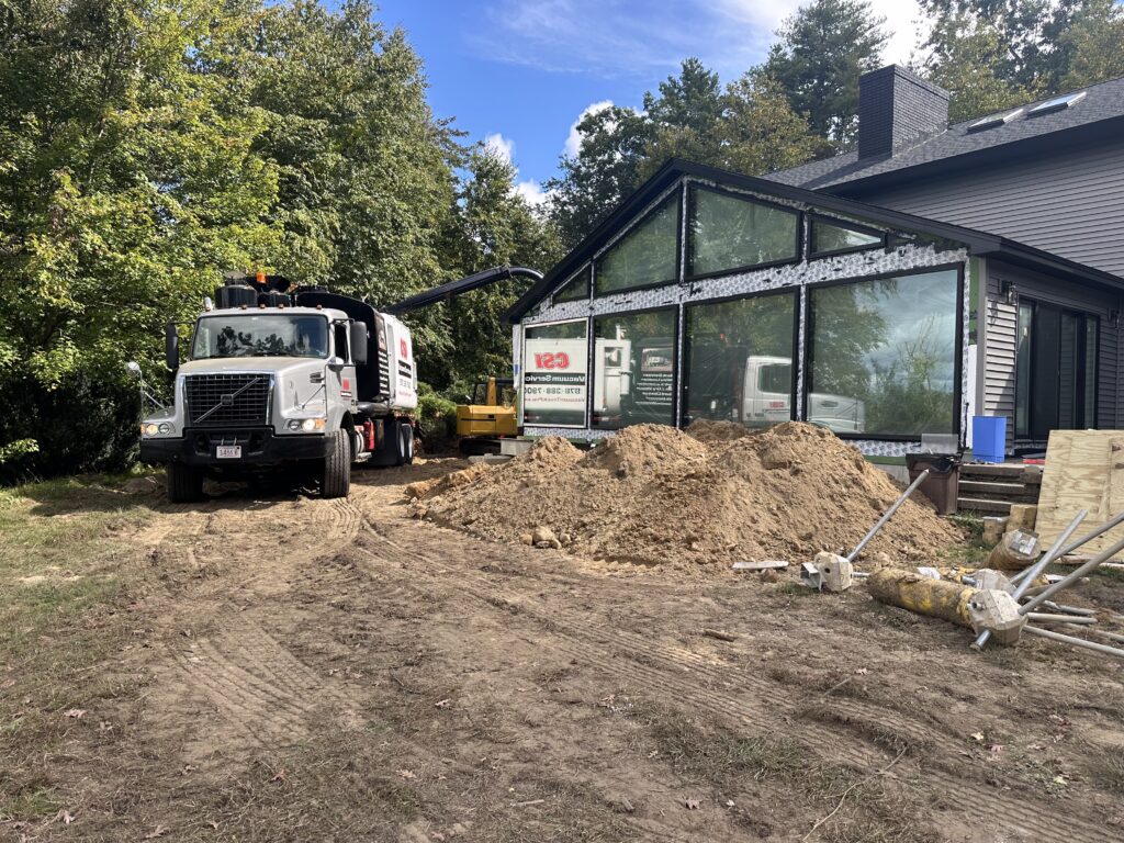 Vacuum excavation around house foundation
