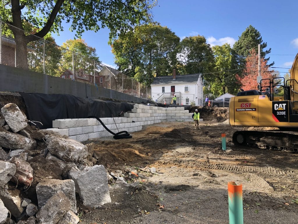 traditional excavation retaining wall installation construction solutions inc