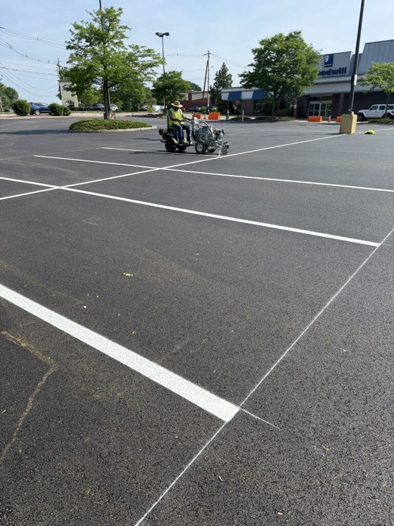 Capital improvement project; parking lot line striping after repaving commercial plaza eastern_ma