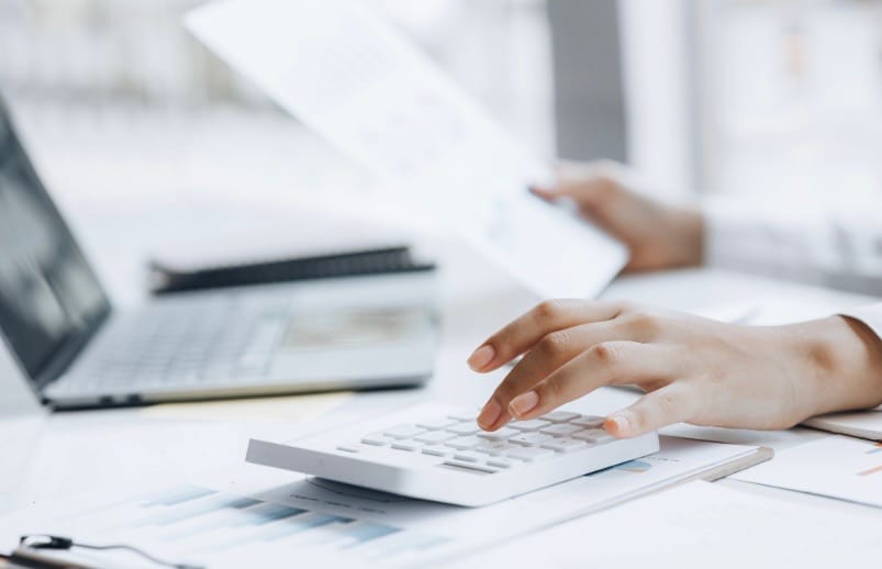 calculator and paper for budget planning