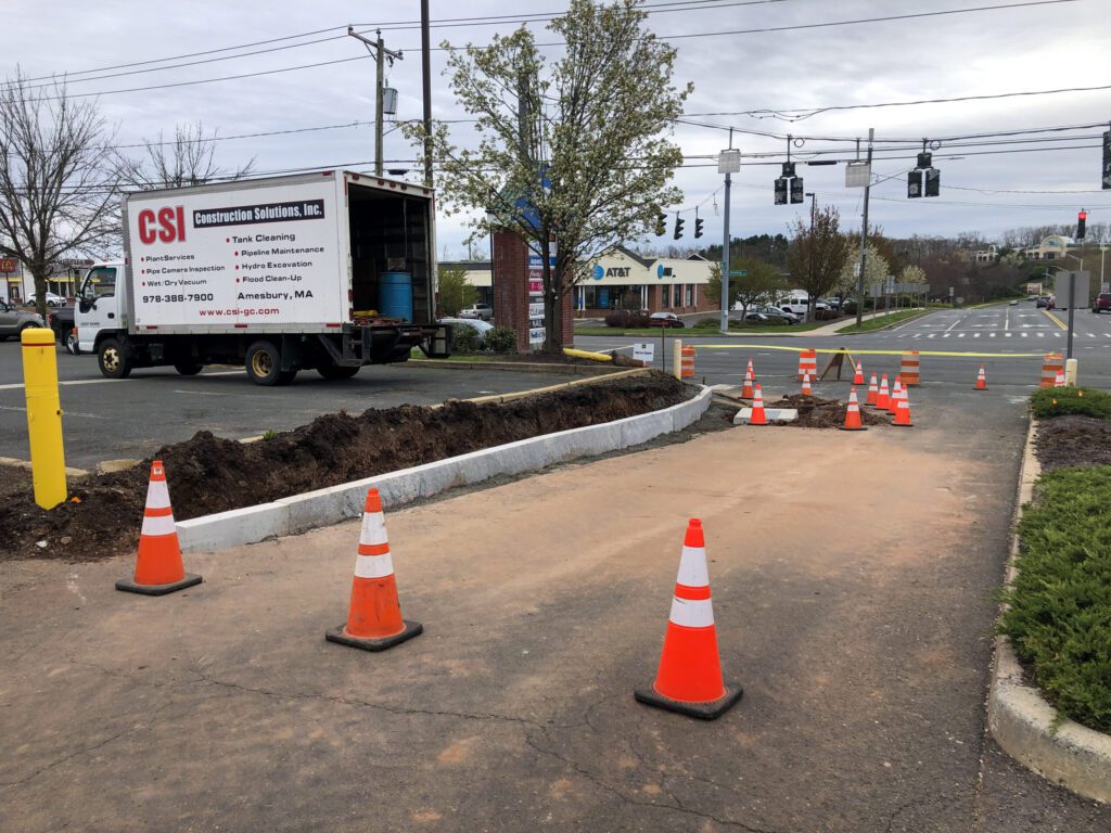 Construction in MA, installation of curbing