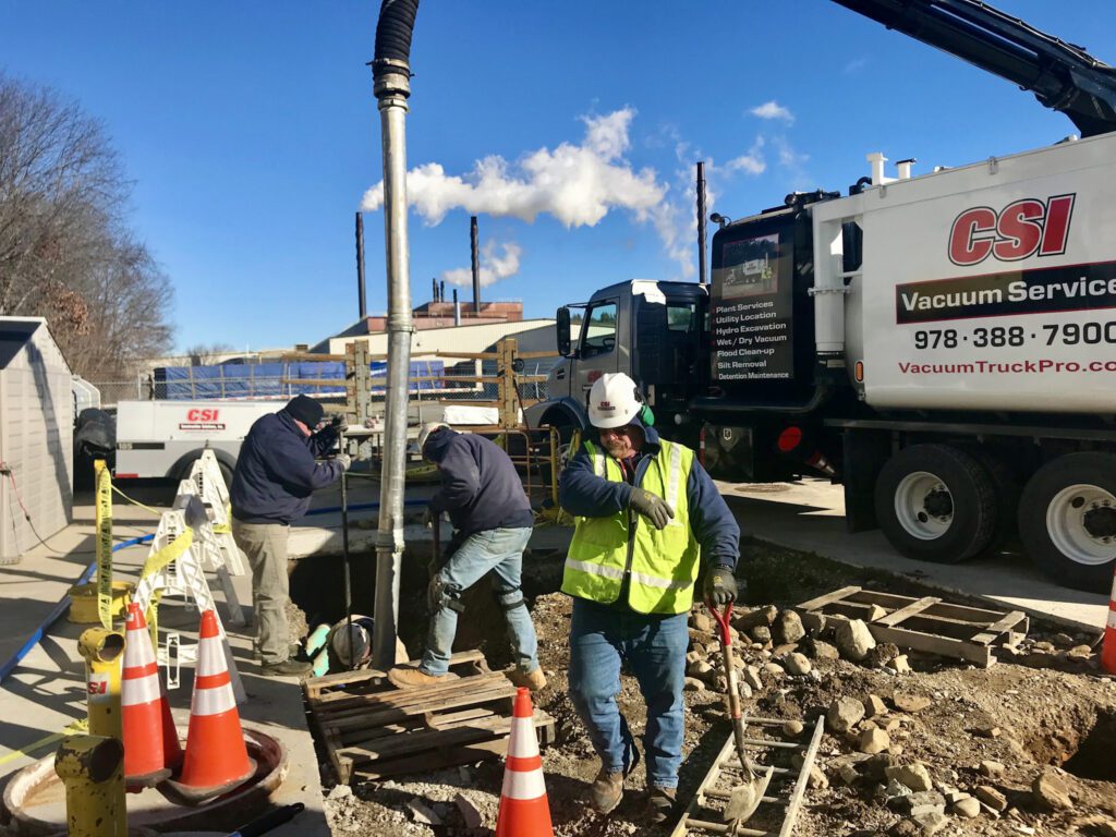 vacuum excavation with three contractors performing precise excavation