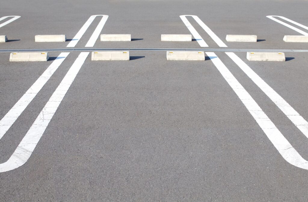 curb design and installation in a parking lot