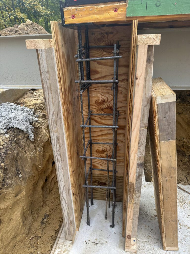 footing support forms for new structural pillars