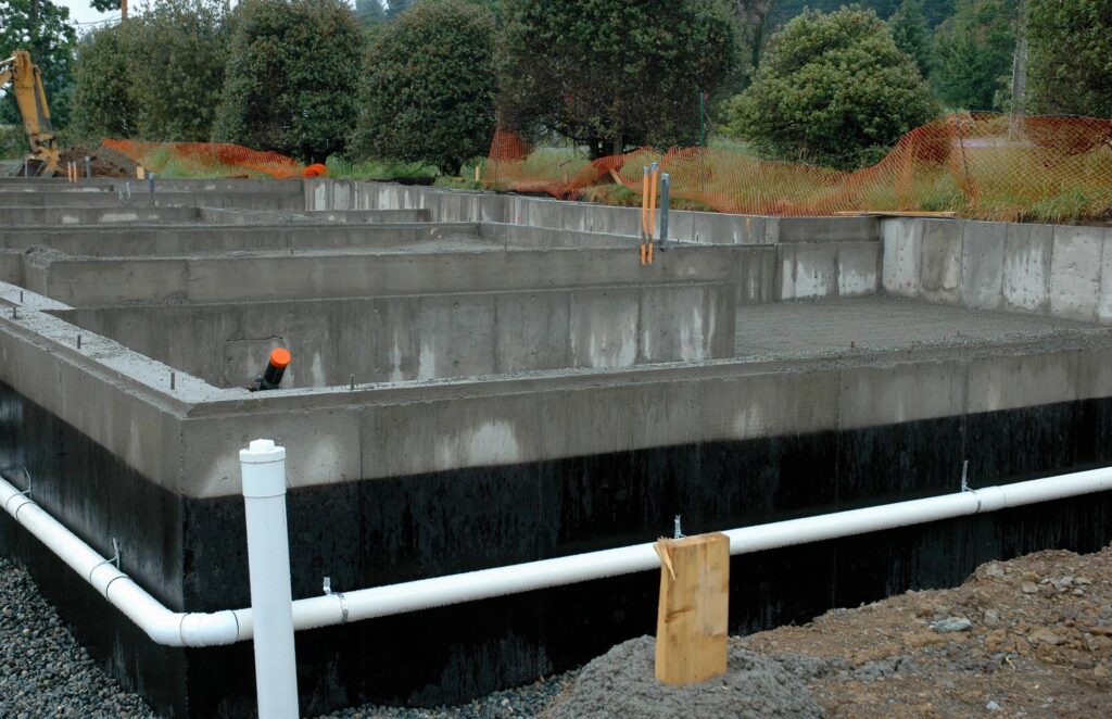 new foundation pour with piping pre grading stage